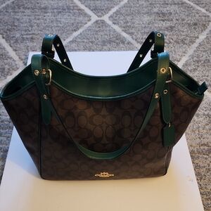 Coach Meadow Shoulder Bag In Signature Canvas. Dark Brown With Green Accents.
